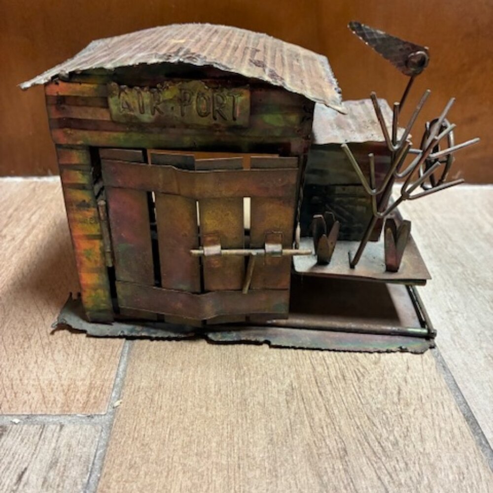 Vintage Metal Barnstormer/ Bi-plane in a barn art